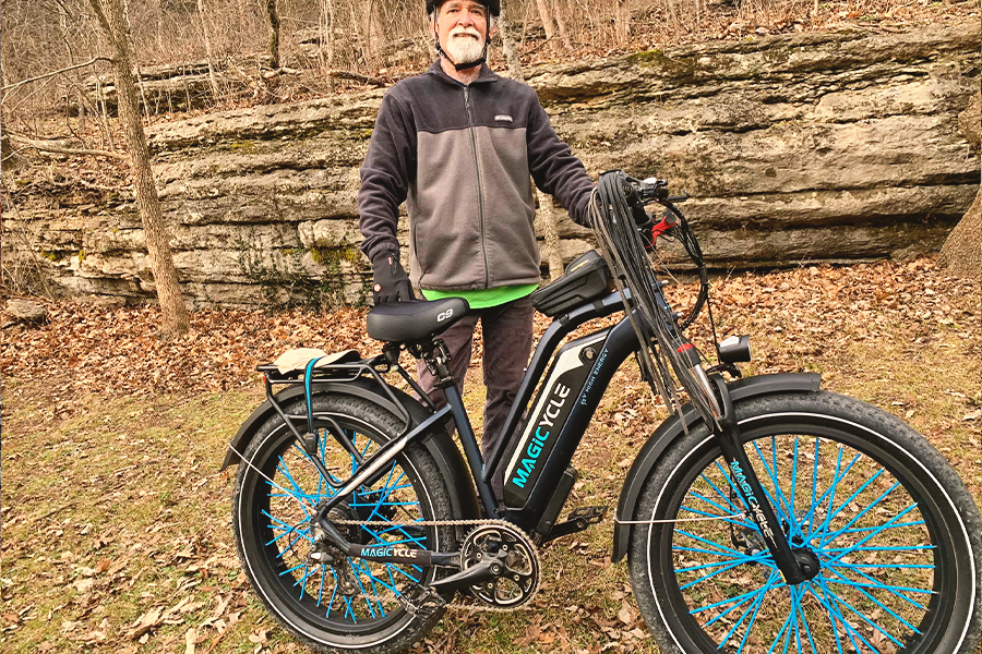 senior and his electric mountain bike