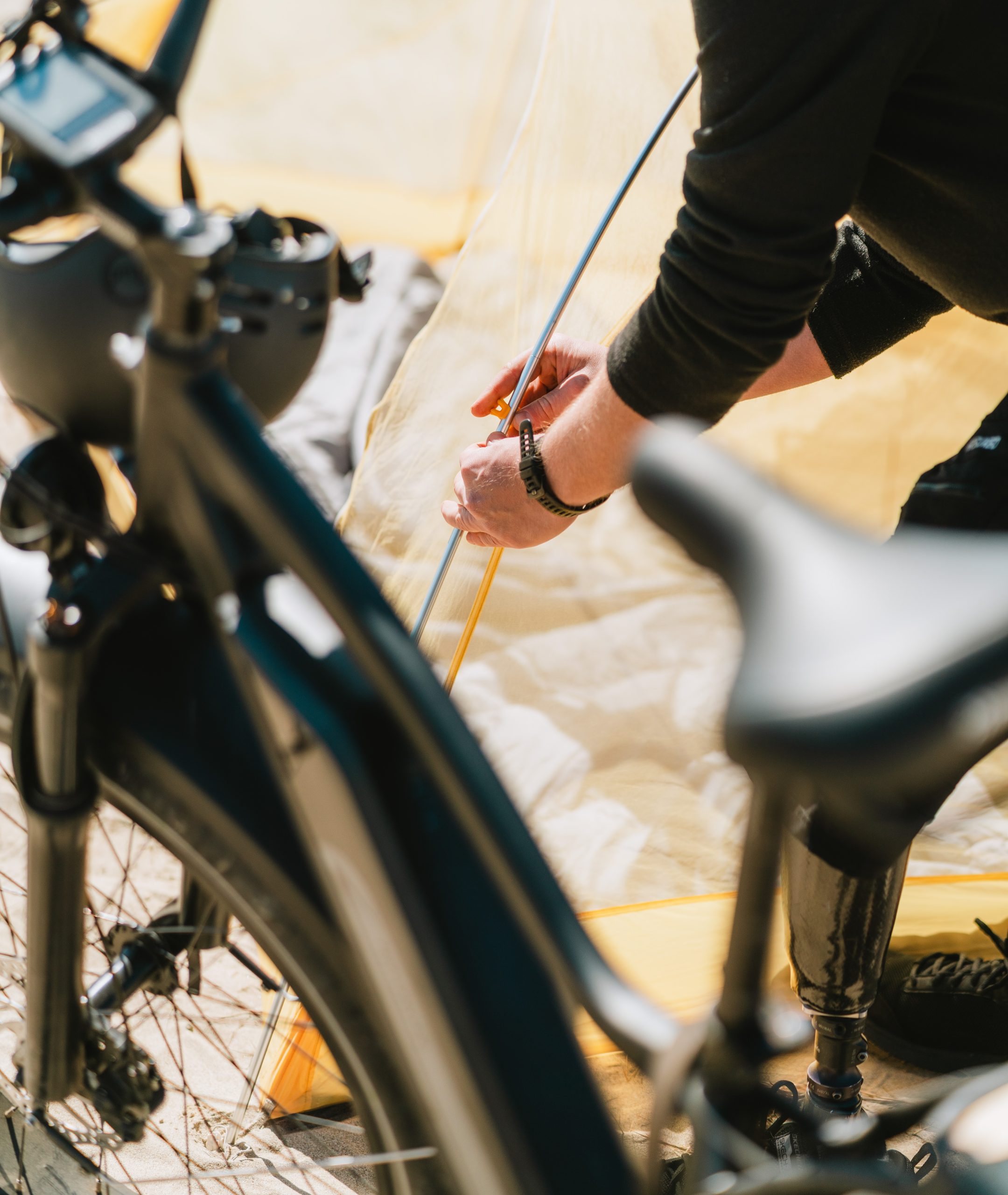 man fixing his electric bike