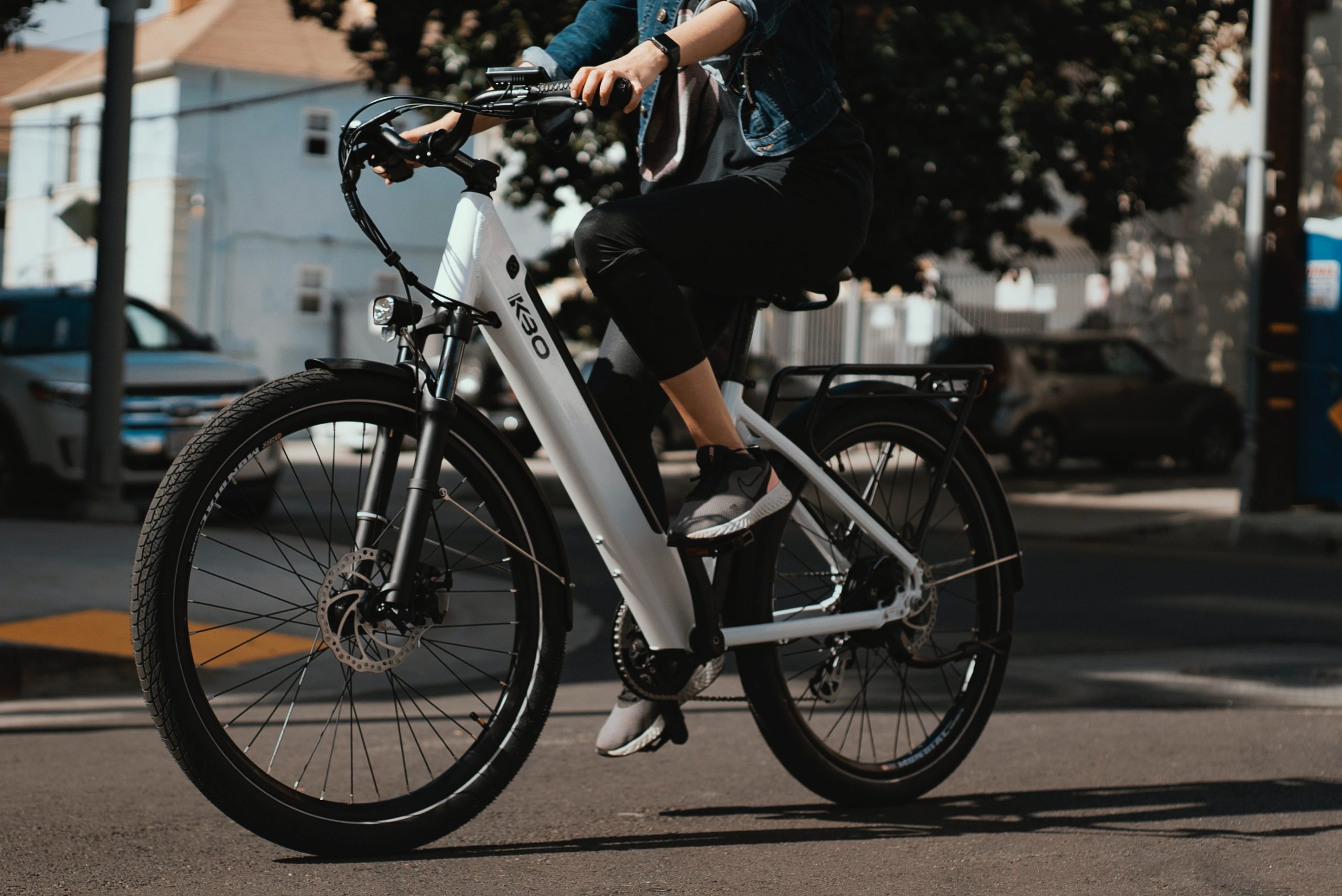 person riding a white electric bike